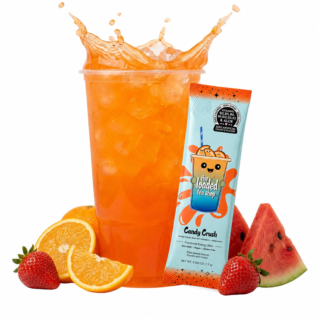 A clear plastic cup filled with orange iced drink and a splash, shown with a single candy cane flavor stick pack beside it and fruit slices around the base: orange wedges, strawberries, and watermelon slices, on a white background.